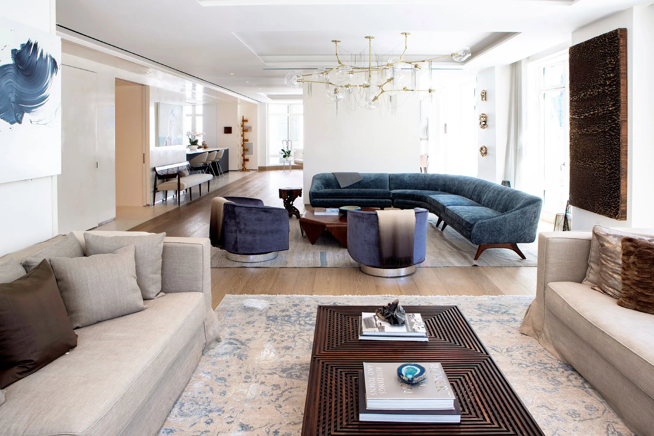 Living room of T Residence in deep blues and warm neutrals